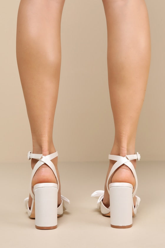 Suttonn Ivory Satin Bow Ankle Strap Pointed-Toe Pumps